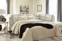 Ashley Falkirk 2-Piece Sectional With Chaise And Sleeper